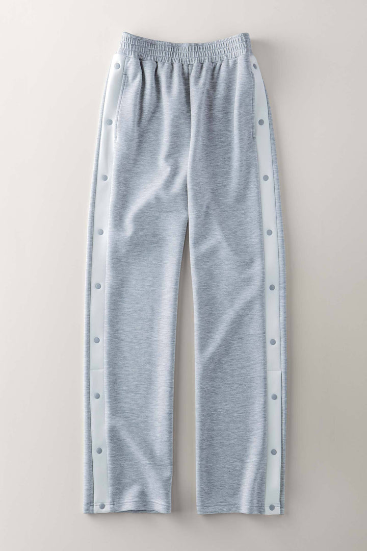 0414-8120 | Pantalones deportivos con botones a presión y rayas en contraste