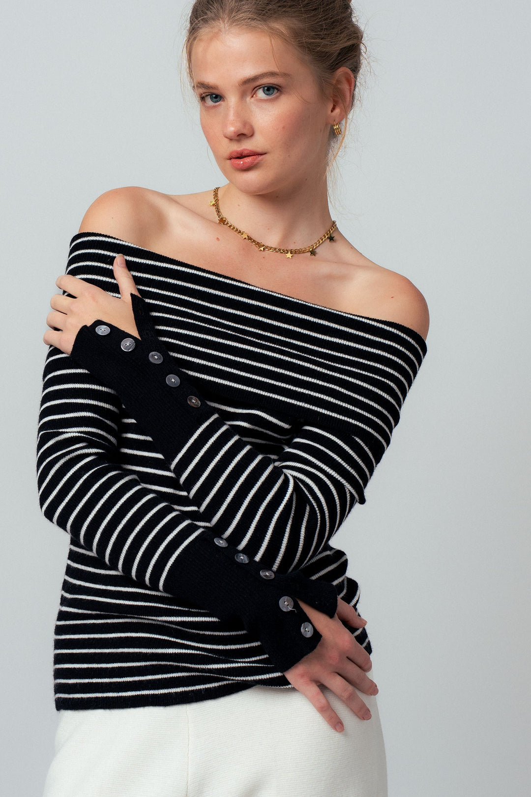 off shoulder striped knit top with button cuffs - black