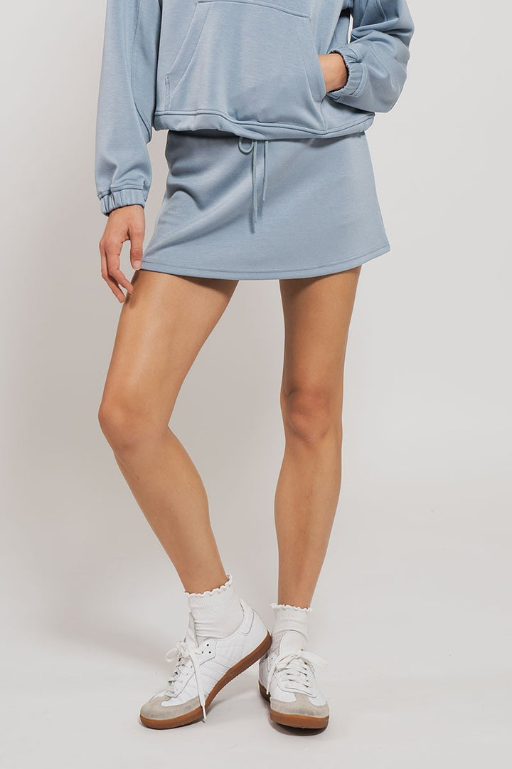 All Around Accent Tennis Skort in Blue Stone - Women's Wholesale Casual Shorts | Trend Notes