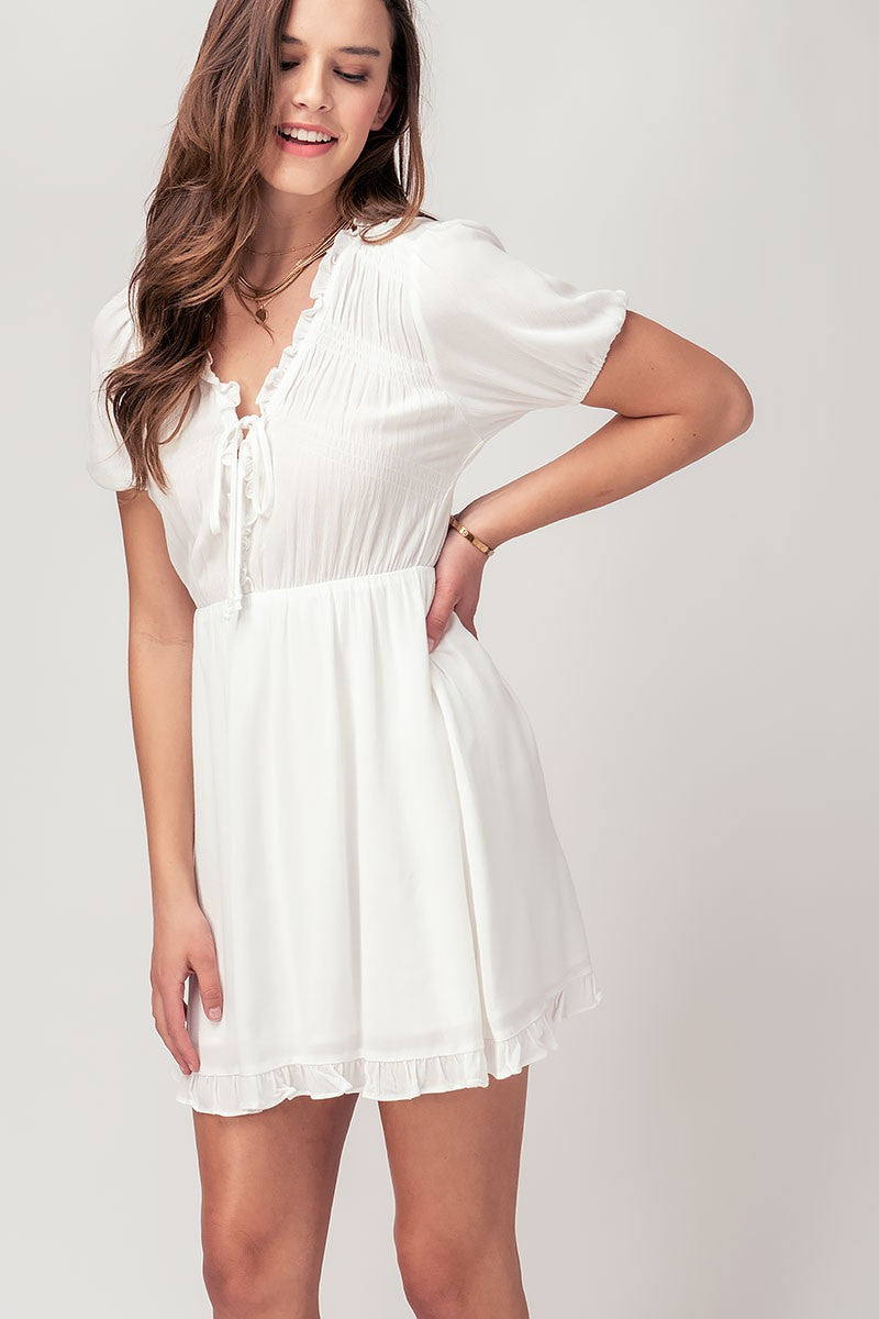 SHIRRED LACE UP FRONT RUFFLE DRESS in Black - Women's Wholesale Casual Dresses | Trend Notes