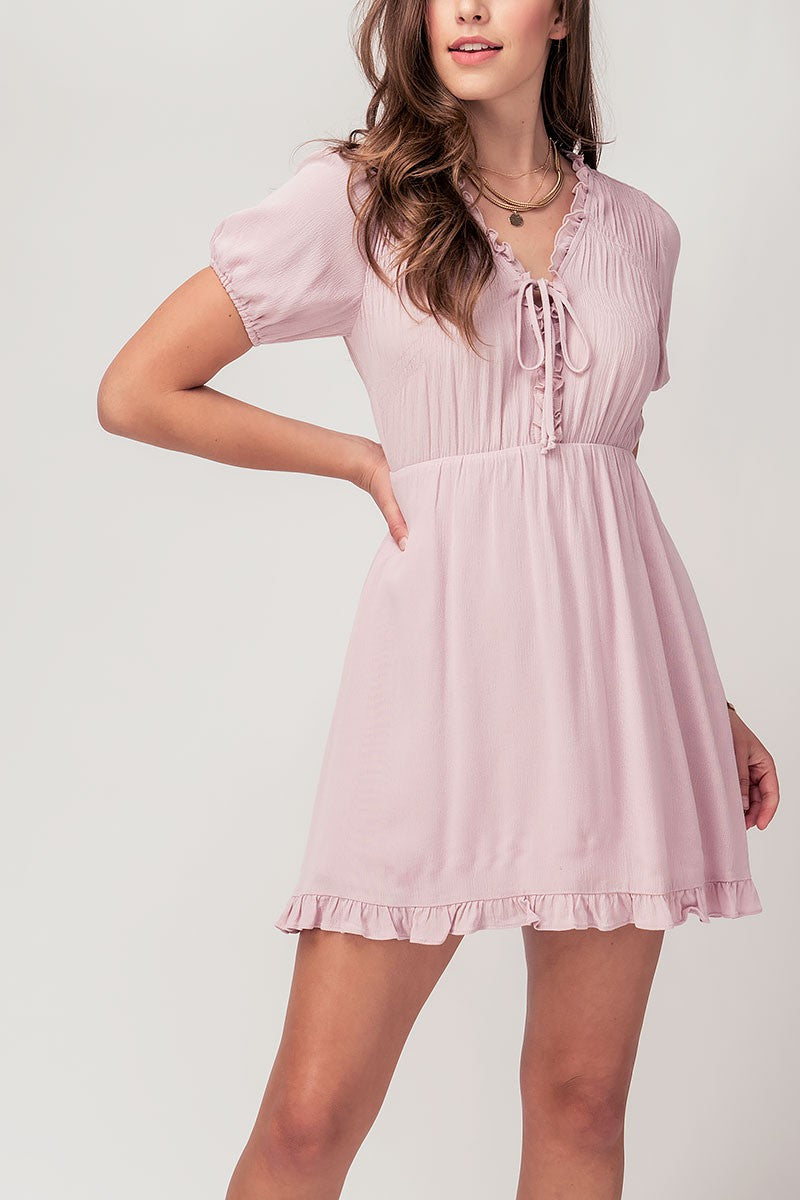 SHIRRED LACE UP FRONT RUFFLE DRESS in Lavender - Women's Wholesale Casual Dresses | Trend Notes