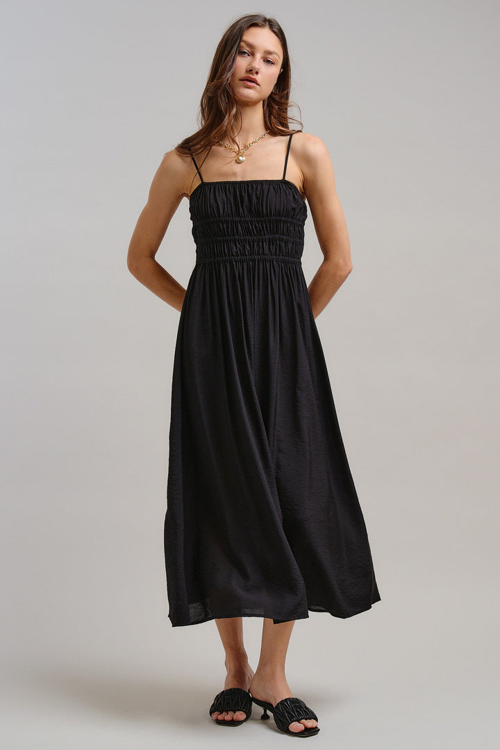 The Drop-Waist Babydoll Midi Dress in Black - Women's Wholesale Dresses | Trend Notes