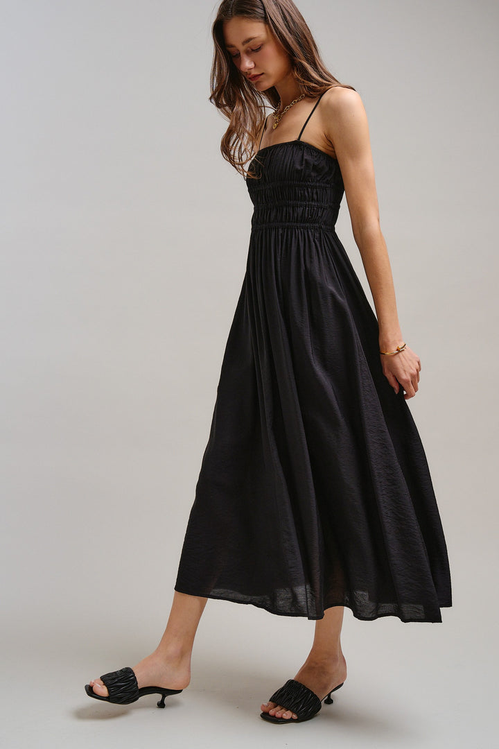 The Drop-Waist Babydoll Midi Dress in Black - Women's Wholesale Dresses | Trend Notes