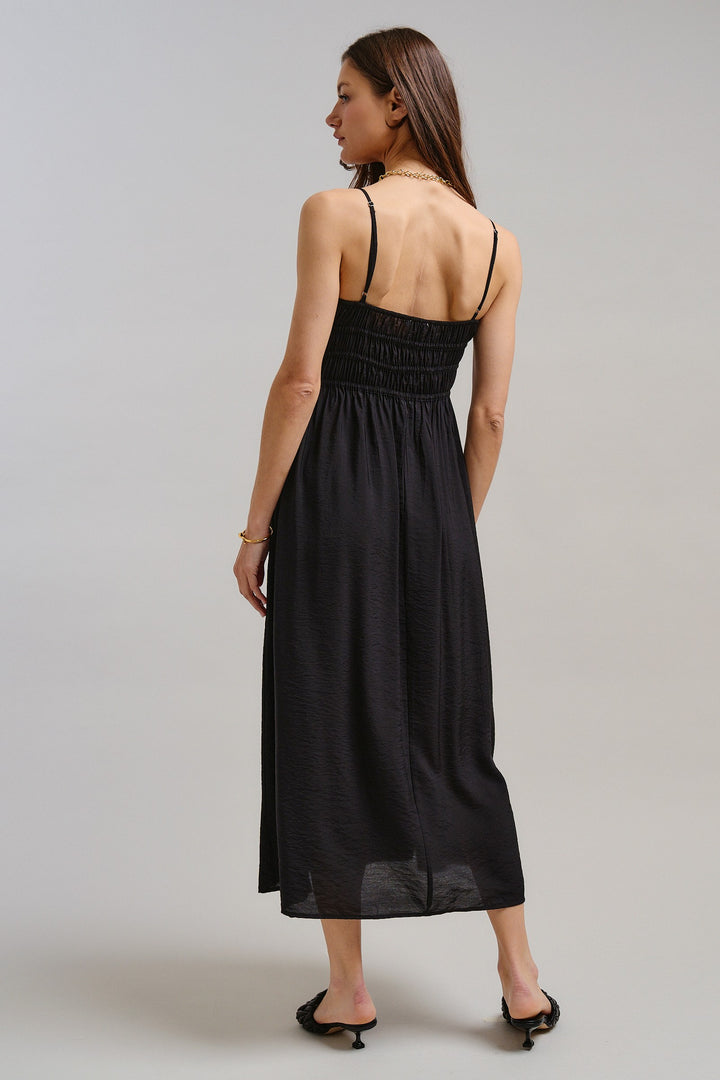 The Drop-Waist Babydoll Midi Dress in Black - Women's Wholesale Dresses | Trend Notes