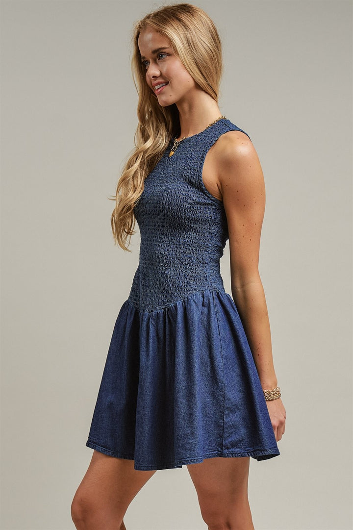 Smocked Denim Mini Dress Drop Waist Coastal Cowgirl Y2K Slee in Indigo - Women's Wholesale Dresses | Trend Notes