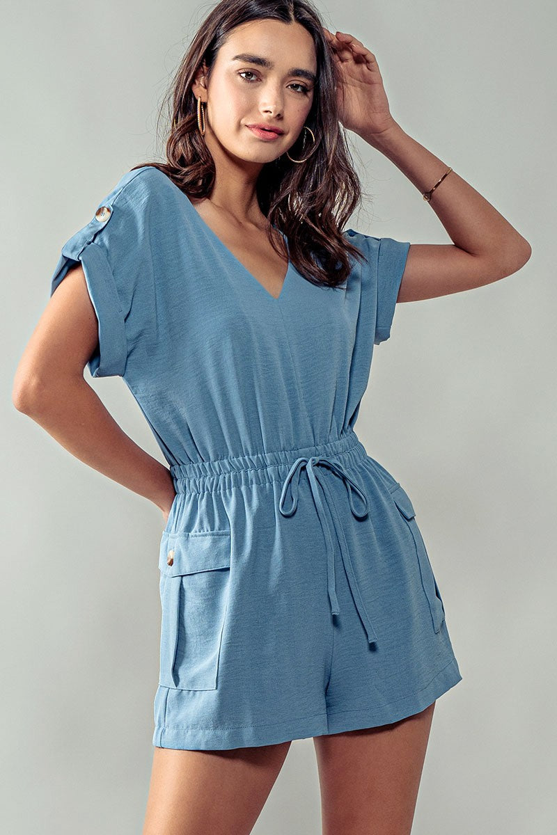 The Straightforward Romper - Cargo Pockets in Dusty Blue - Women's Wholesale Rompers | Trend Notes