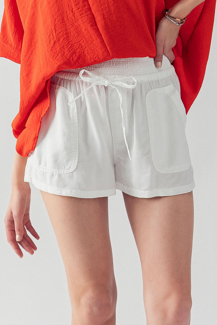 DENIM SMOCK WASITED SHORTS in White - Women's Wholesale Casual Shorts | Trend Notes