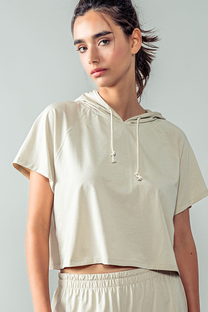 Short Sleeve Cropped Hoodie Top w/Drawstring Hood in Oat Milk - Women's Wholesale Sweatshirts & Hoodies | Trend Notes