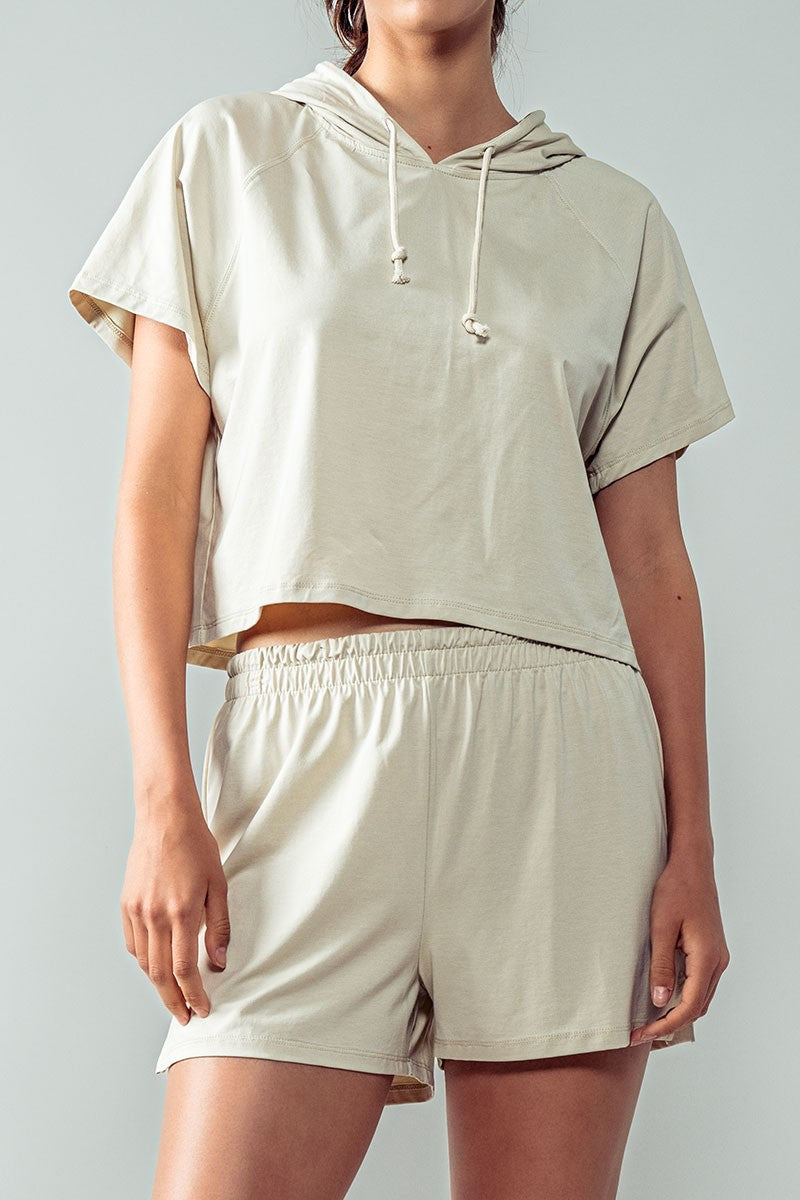 Short Sleeve Cropped Hoodie Top w/Drawstring Hood in Oat Milk - Women's Wholesale Sweatshirts & Hoodies | Trend Notes