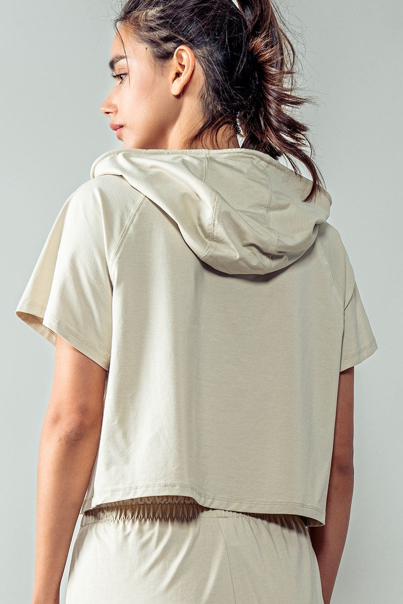 Short Sleeve Cropped Hoodie Top w/Drawstring Hood in Oat Milk - Women's Wholesale Sweatshirts & Hoodies | Trend Notes