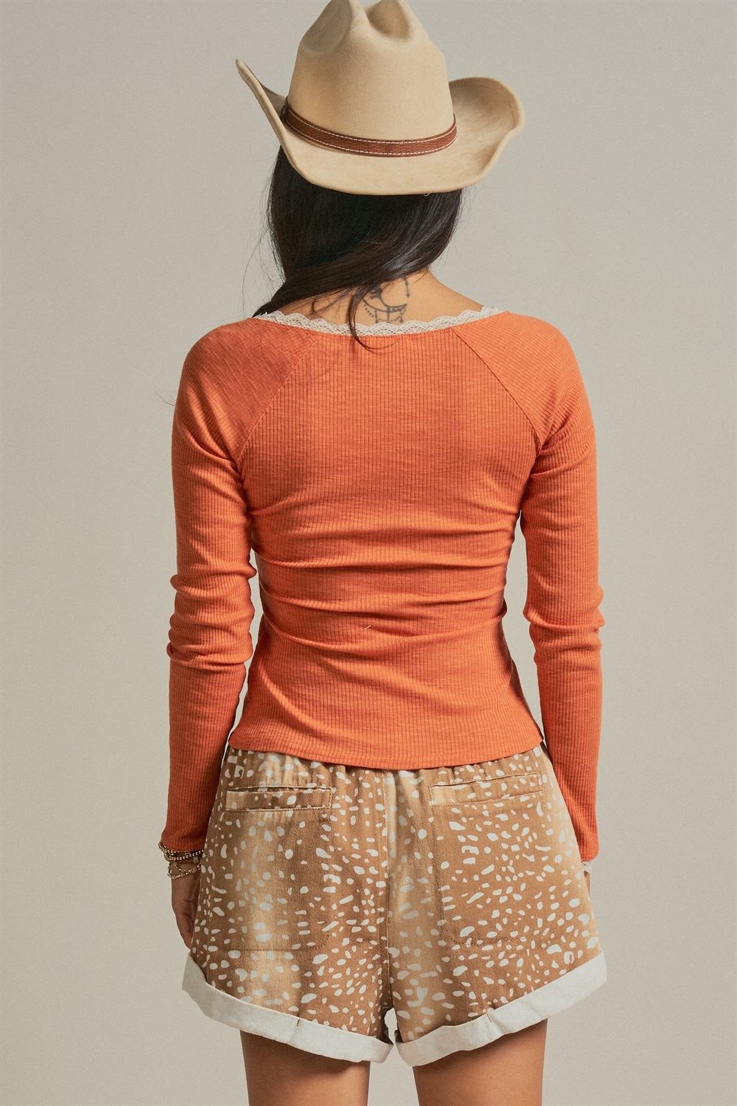 Texas Tailgate Henley Graphic Knit Top in Burnt Orange - Women's Wholesale TOPS | Trend Notes