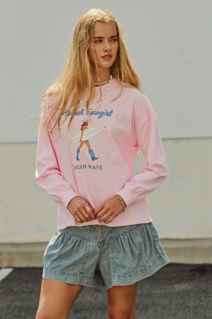 Beach Cowgirl Graphic Long Sleeve Sweatshirt in Lt Pink - Women's Wholesale Fashion | Trend Notes