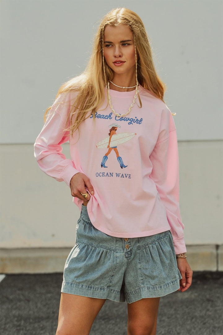 Beach Cowgirl Graphic Long Sleeve Sweatshirt in Lt Pink - Women's Wholesale Fashion | Trend Notes