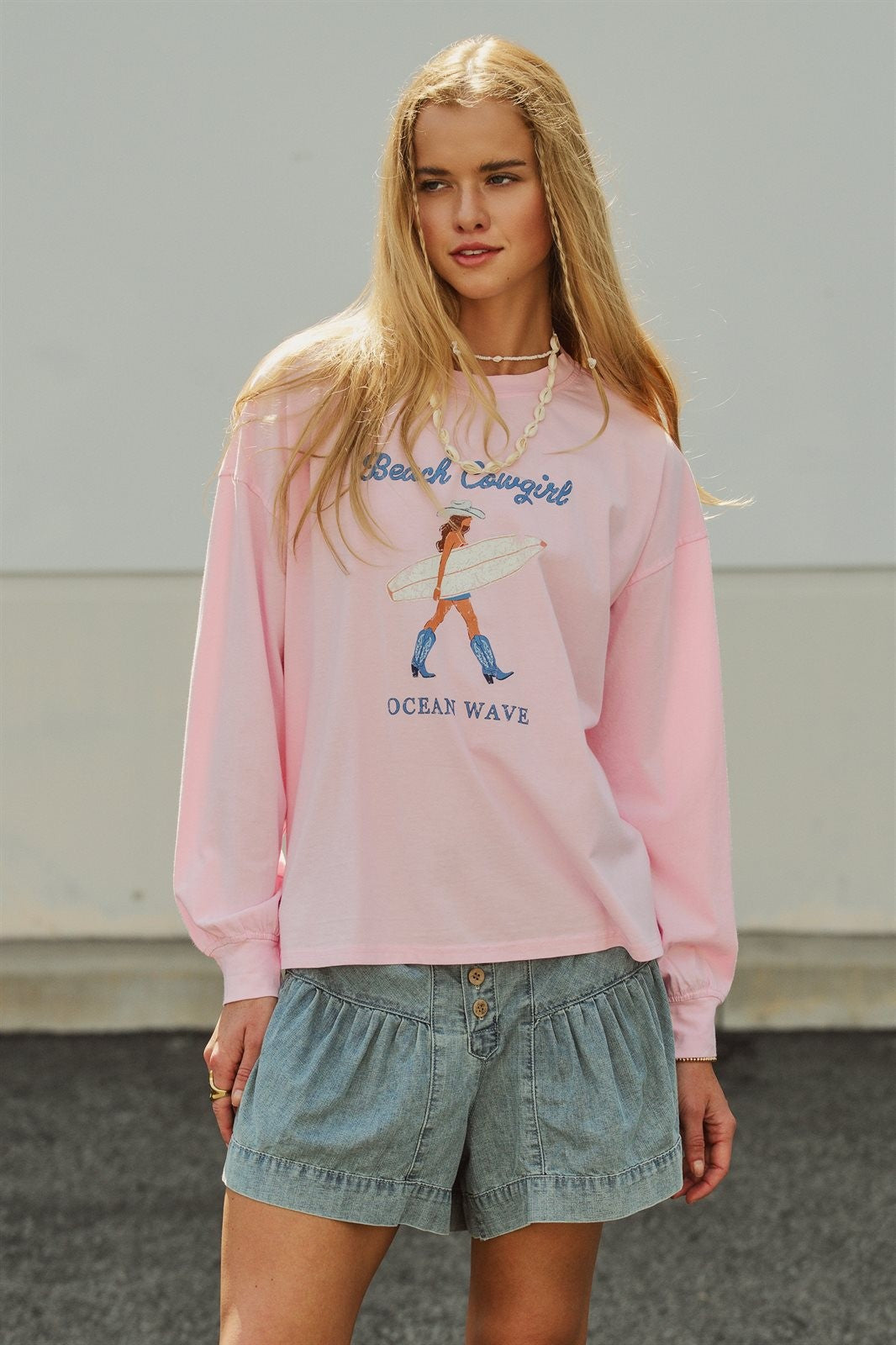Beach Cowgirl Graphic Long Sleeve Sweatshirt in Lt Pink - Women's Wholesale Fashion | Trend Notes