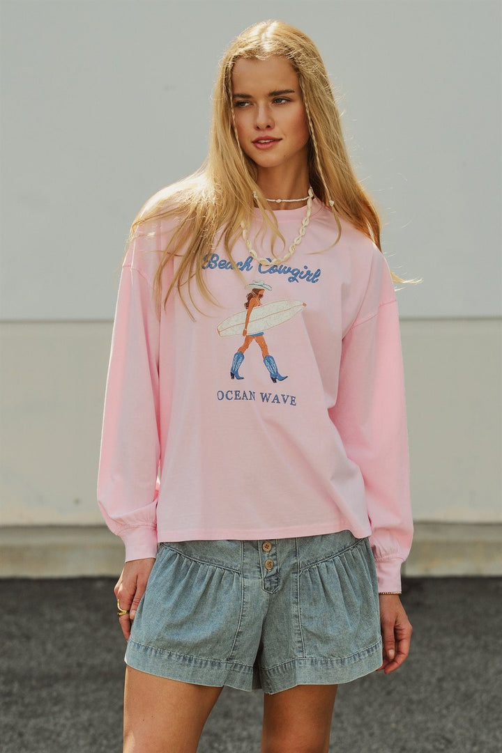Beach Cowgirl Graphic Long Sleeve Sweatshirt in Lt Pink - Women's Wholesale Fashion | Trend Notes