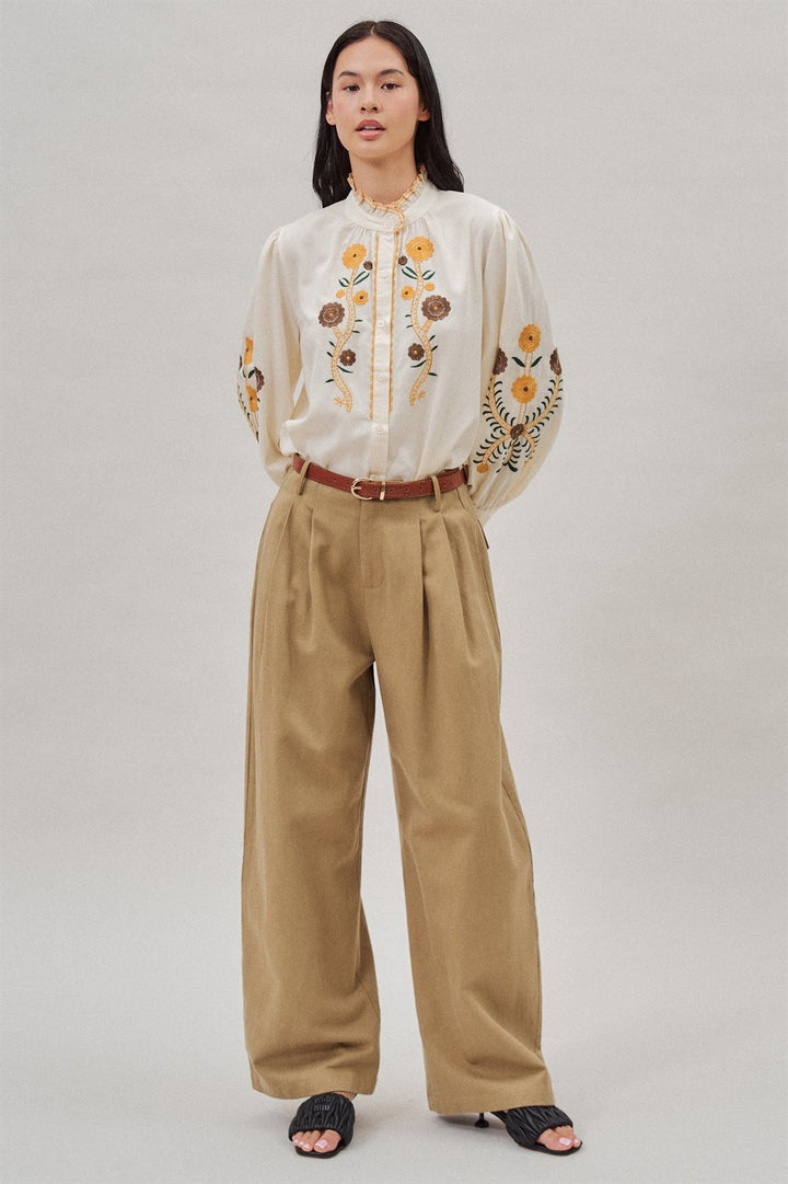 Embroidered Ruffle Neck Blouse in Western Folk Style in Ivory - Women's Wholesale Blankets | Trend Notes