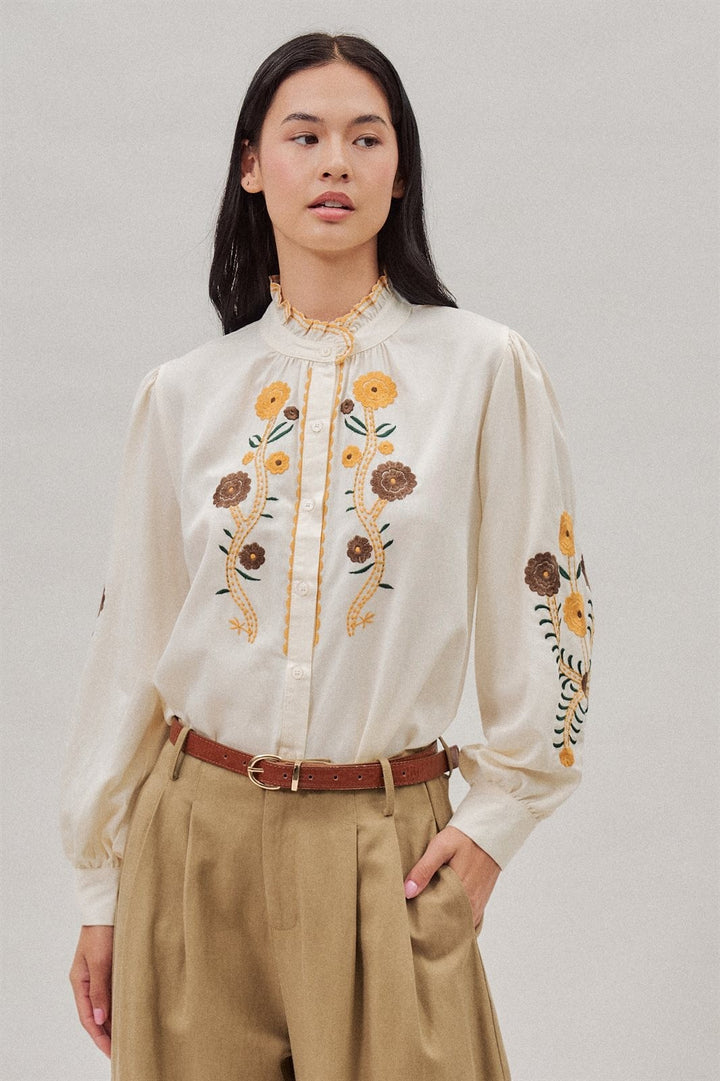 Embroidered Ruffle Neck Blouse in Western Folk Style in Ivory - Women's Wholesale Blankets | Trend Notes