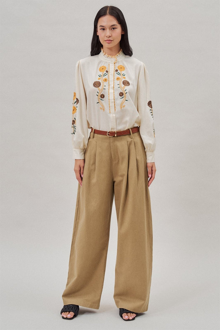 Embroidered Ruffle Neck Blouse in Western Folk Style in Ivory - Women's Wholesale Blankets | Trend Notes