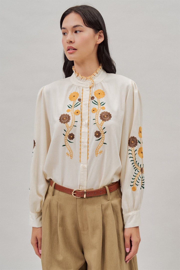 Embroidered Ruffle Neck Blouse in Western Folk Style in Ivory - Women's Wholesale Blankets | Trend Notes