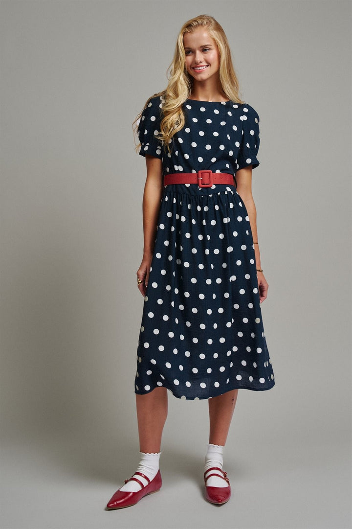 Polka Dot Belted Puff Sleeve Midi Dress in Navy - Women's Wholesale Casual Dresses | Trend Notes