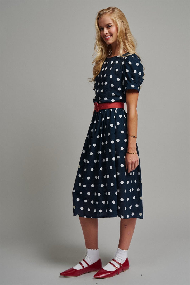 Polka Dot Belted Puff Sleeve Midi Dress in Navy - Women's Wholesale Casual Dresses | Trend Notes