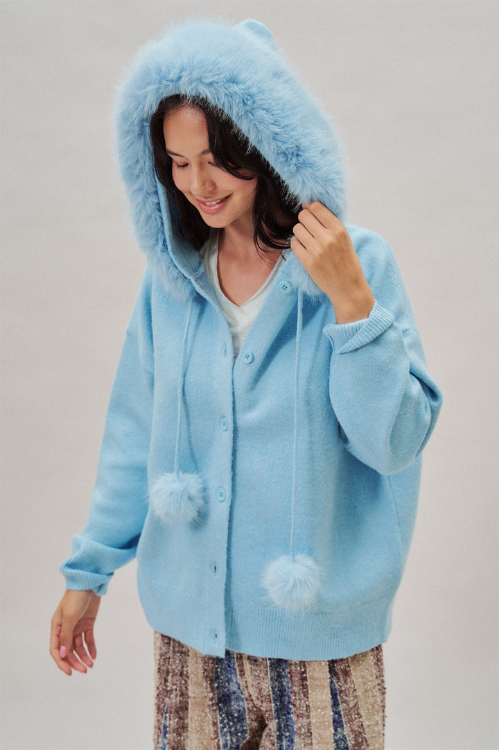 Faux Fur Hood Pom Pom Cardigan Wool Blend in Baby Blue in Blue - Women's Wholesale Cardigans & Shrugs | Trend Notes