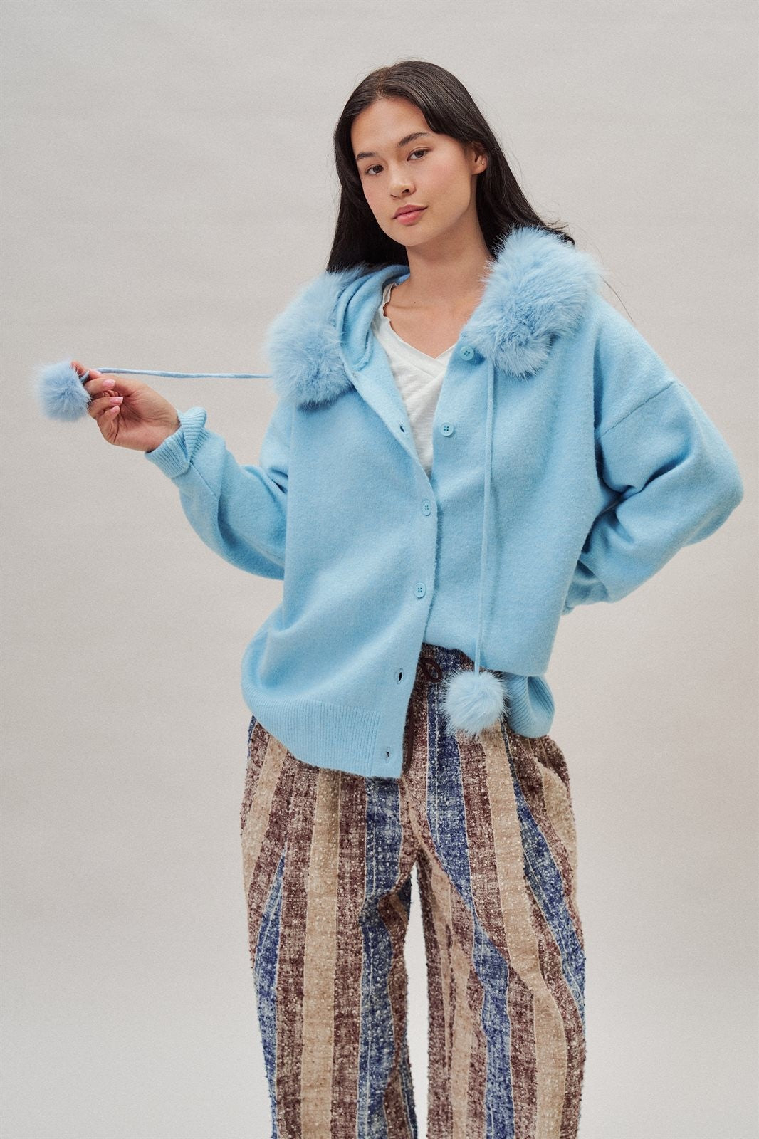 Faux Fur Hood Pom Pom Cardigan Wool Blend in Baby Blue in Blue - Women's Wholesale Cardigans & Shrugs | Trend Notes