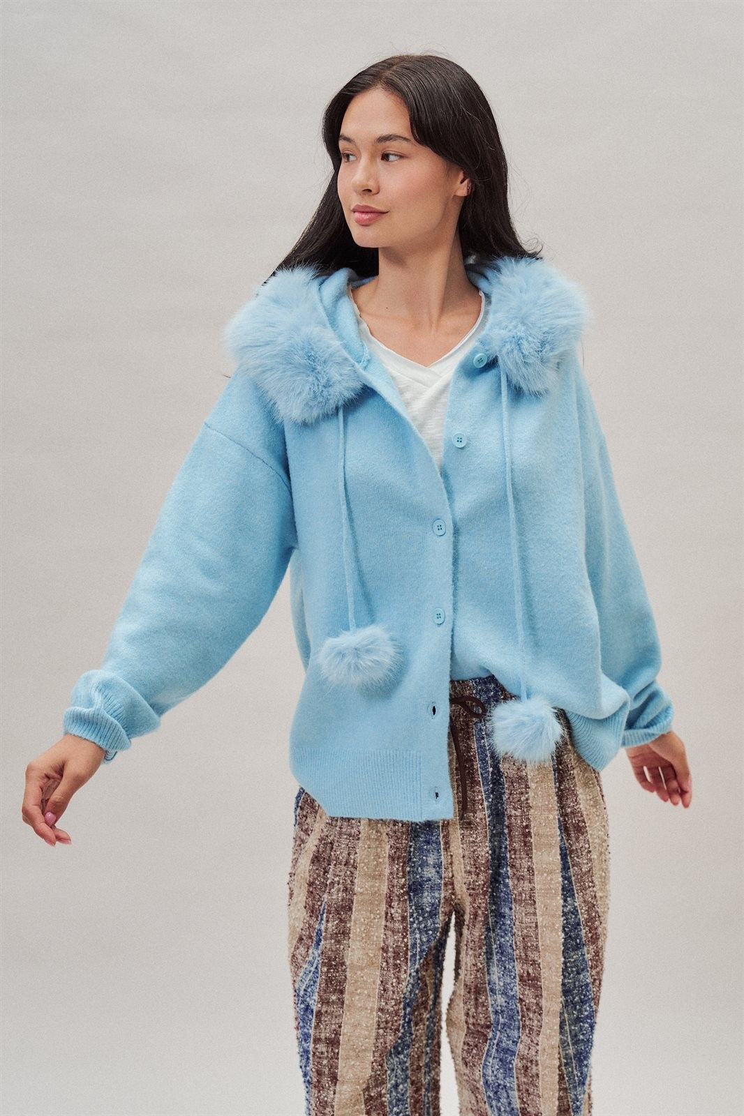 Faux Fur Hood Pom Pom Cardigan Wool Blend in Baby Blue in Blue - Women's Wholesale Cardigans & Shrugs | Trend Notes
