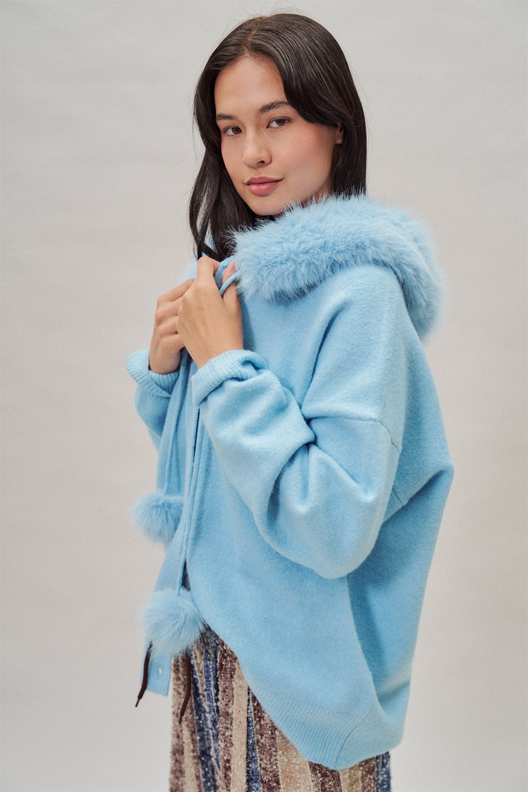 Faux Fur Hood Pom Pom Cardigan Wool Blend in Baby Blue in Blue - Women's Wholesale Cardigans & Shrugs | Trend Notes