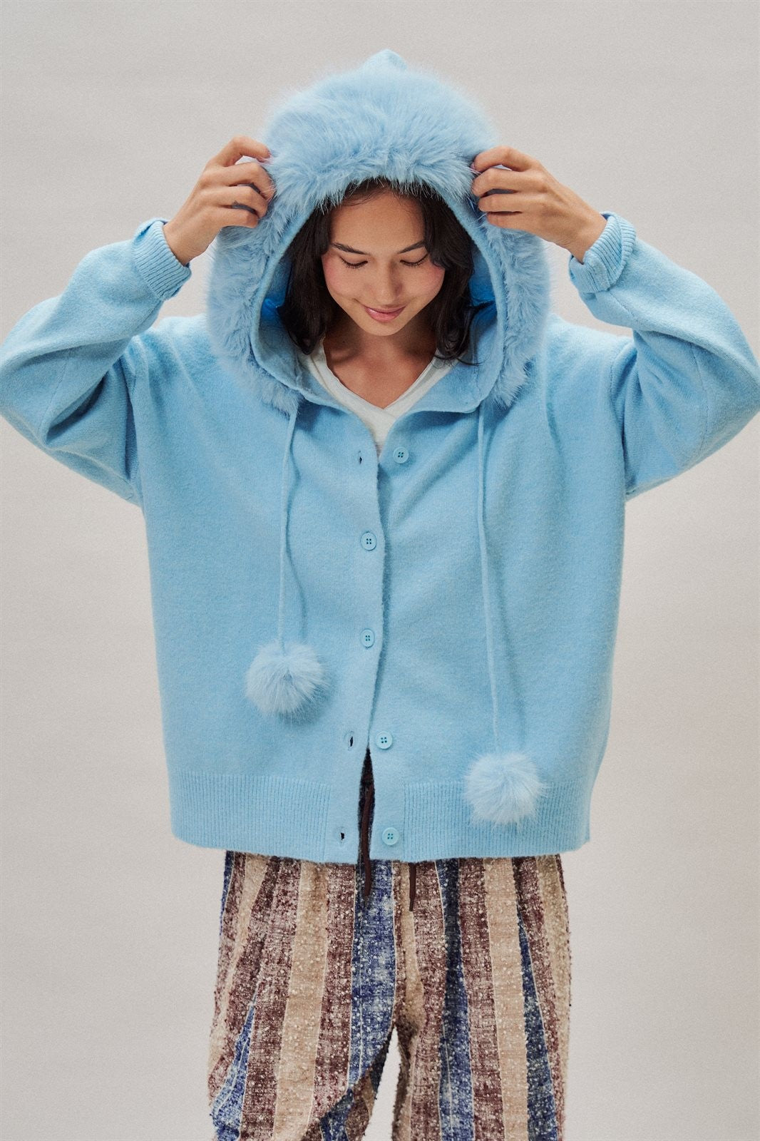 Faux Fur Hood Pom Pom Cardigan Wool Blend in Baby Blue in Blue - Women's Wholesale Cardigans & Shrugs | Trend Notes