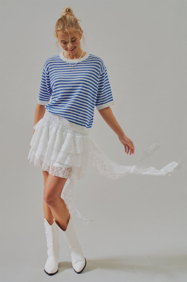 Tiered Lace Ruffle Mini Skirt with Asymmetric Hem in White - Women's Wholesale Skirts | Trend Notes