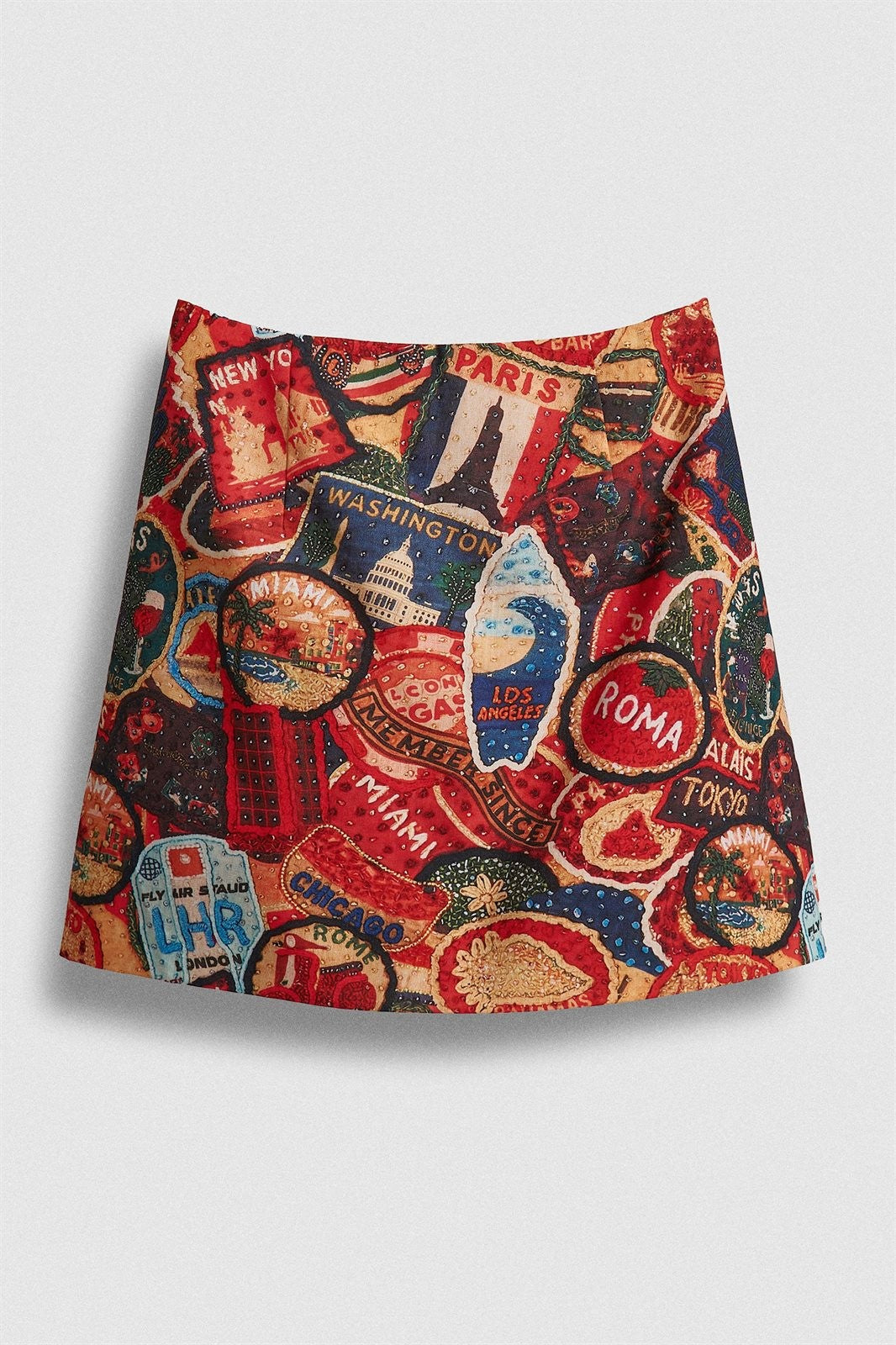 Travel Patch Print Mini Skirt in Italian Summer Vacation in Multi - Women's Wholesale Skirts | Trend Notes