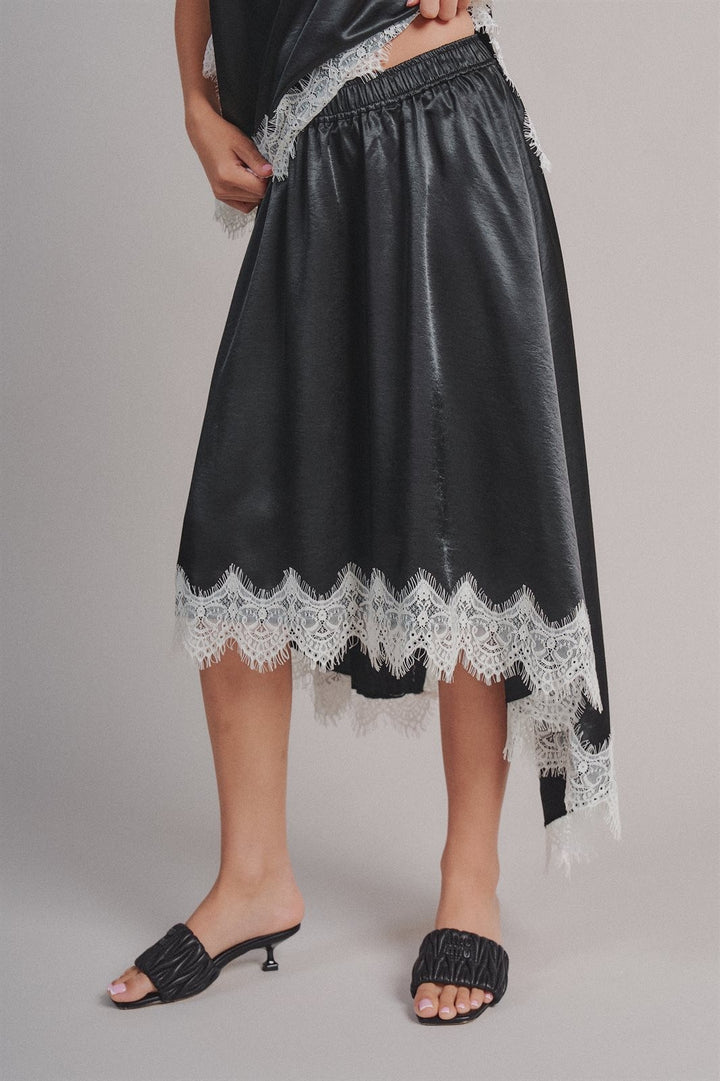 Lace Trim Satin Asymmetric Midi Skirt in Black - Women's Wholesale Midi Skirts | Trend Notes