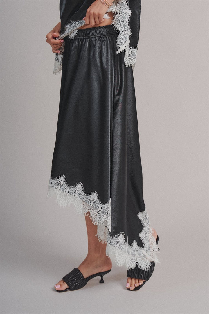 Lace Trim Satin Asymmetric Midi Skirt in Black - Women's Wholesale Midi Skirts | Trend Notes