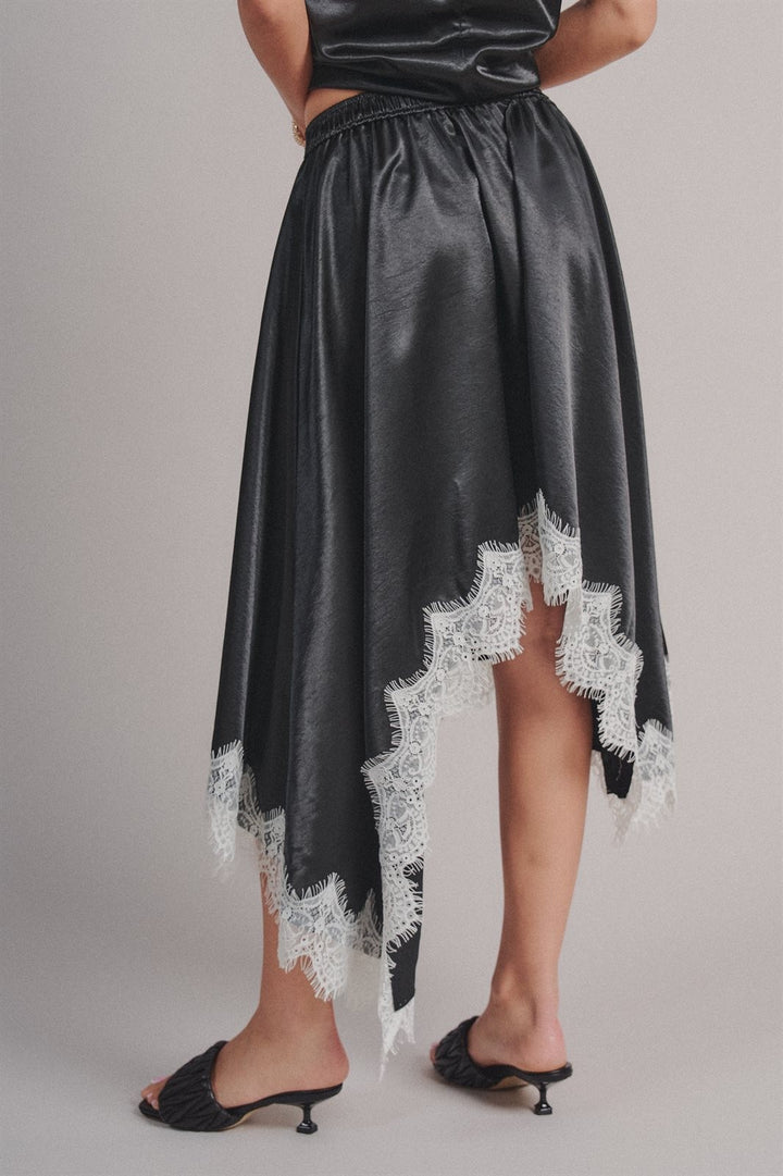 Lace Trim Satin Asymmetric Midi Skirt in Black - Women's Wholesale Midi Skirts | Trend Notes