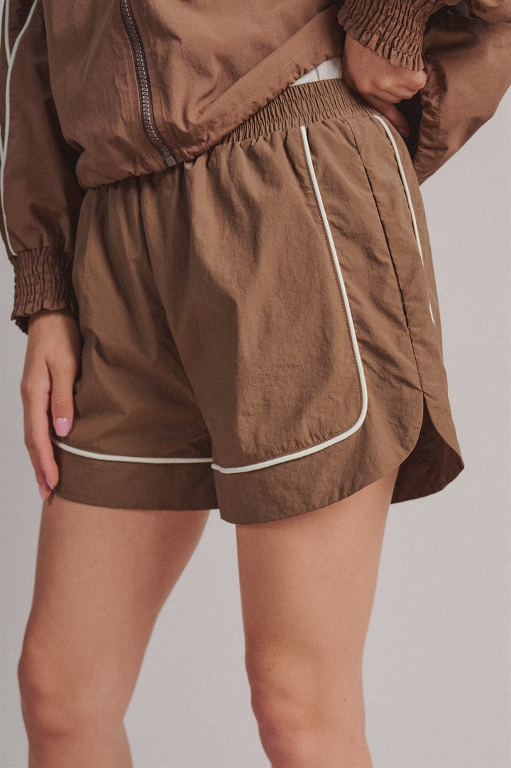 Nylon Track Shorts with Contrast Piping and Elastic Waist in Brown - Women's Wholesale Fashion | Trend Notes