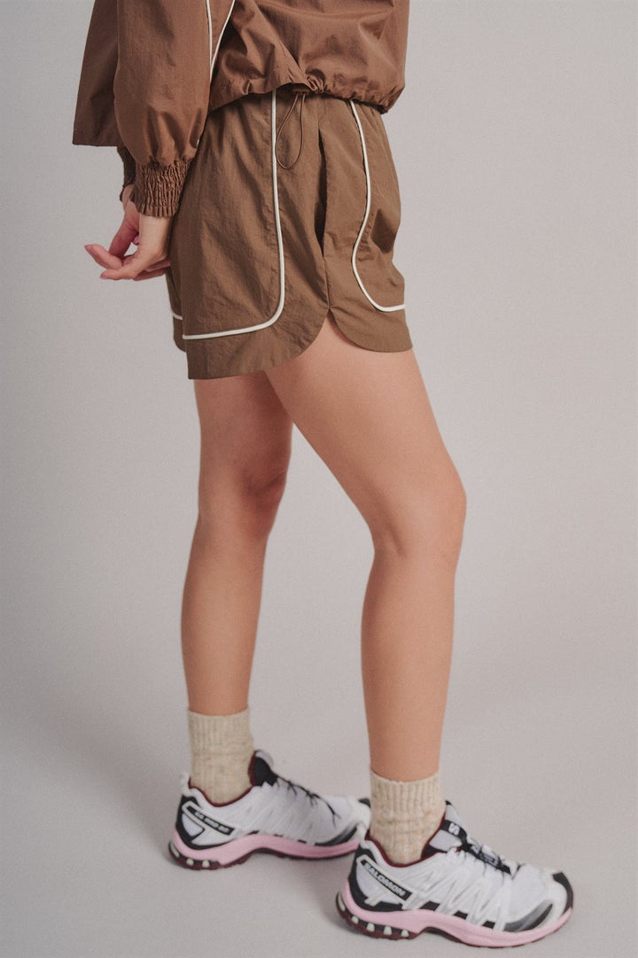 Nylon Track Shorts with Contrast Piping and Elastic Waist in Brown - Women's Wholesale Fashion | Trend Notes