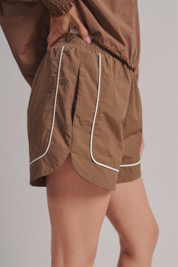 Nylon Track Shorts with Contrast Piping and Elastic Waist in Brown - Women's Wholesale Fashion | Trend Notes