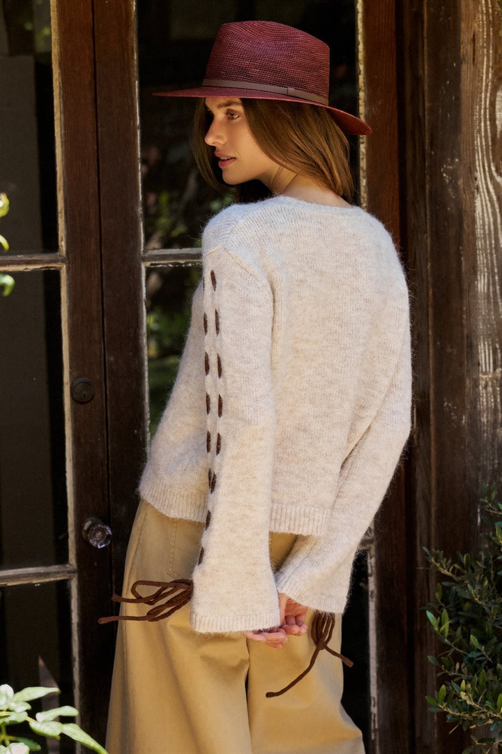 Oversized Sherpa Vest with Contrast Collar and Side Ties in Oatmeal - Women's Wholesale Sweaters | Trend Notes