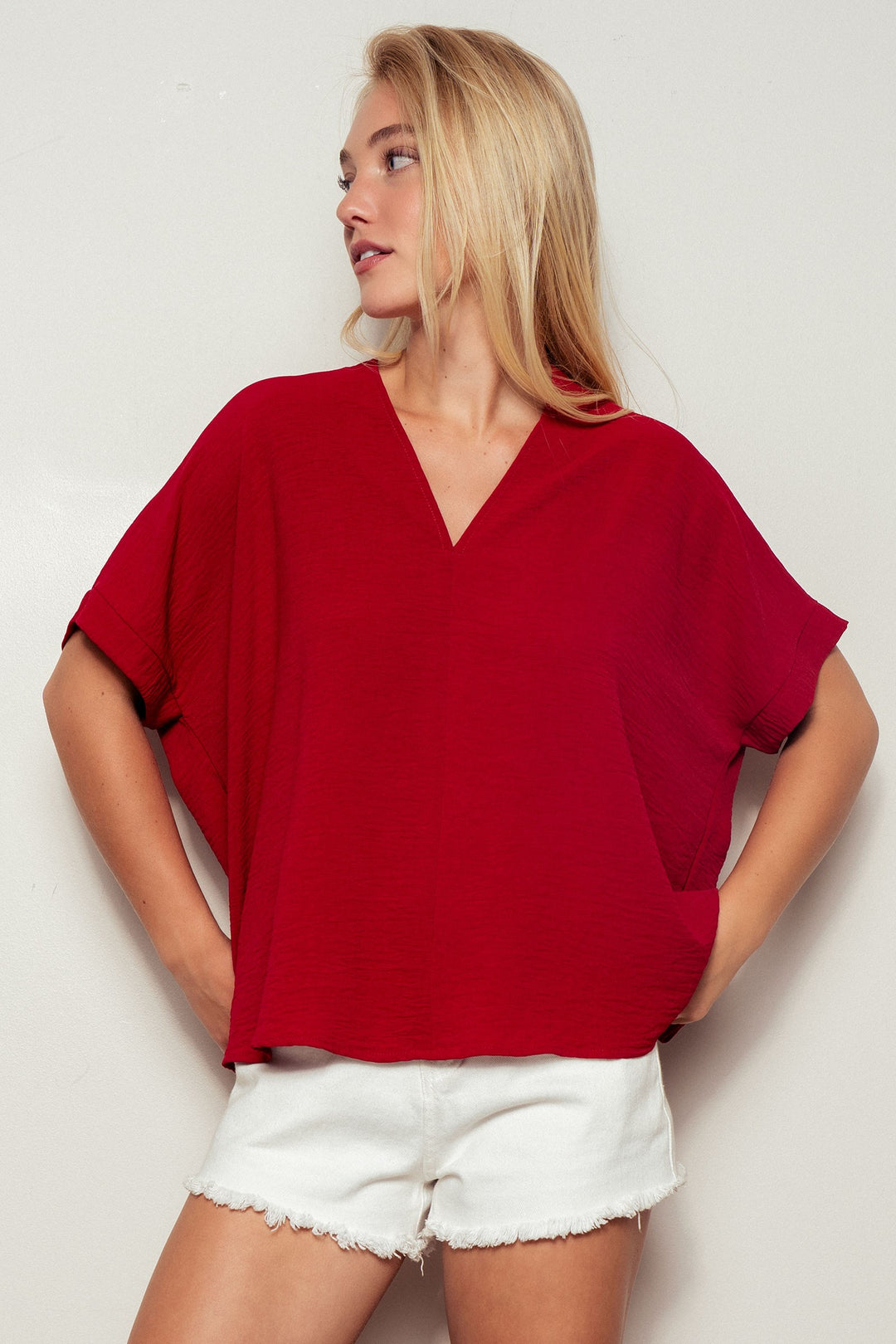 Relaxed V-Neck Folded Casual Top  in Gd Crimson - Women's Wholesale Tops | Trend Notes