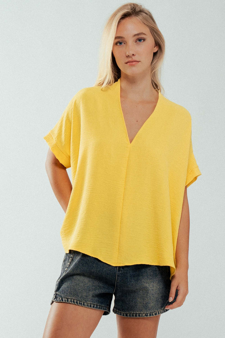 Relaxed V-Neck Folded Casual Top  in Gd Gold - Women's Wholesale Tops | Trend Notes
