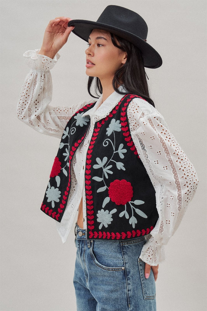 Floral Embroidered Corduroy Vest with Heart Vine Trim in Black - Women's Wholesale Vests | Trend Notes