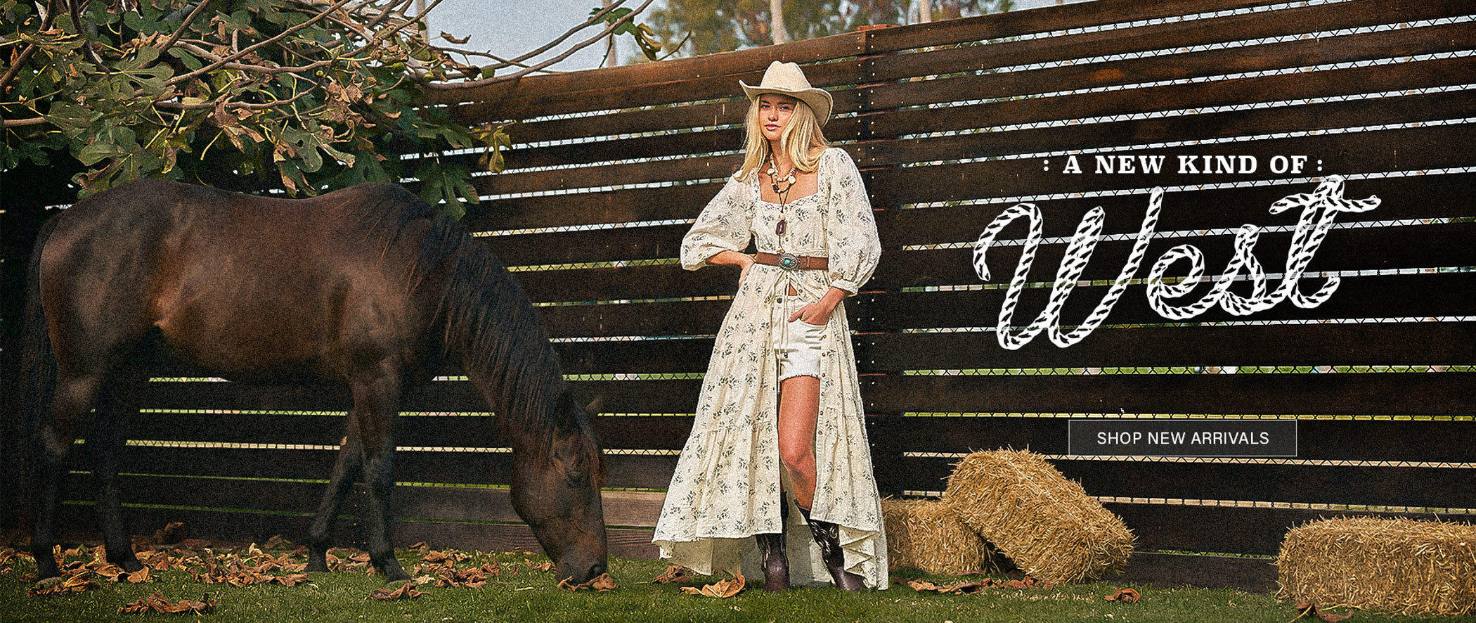 Women’s wholesale western inspired dress styled outdoors with horse, promoting new arrivals